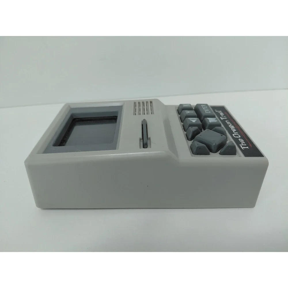 The Oregon Trail‎ Handheld Electronic Game Basic Fun 09597 Retro Travel Toy Grey